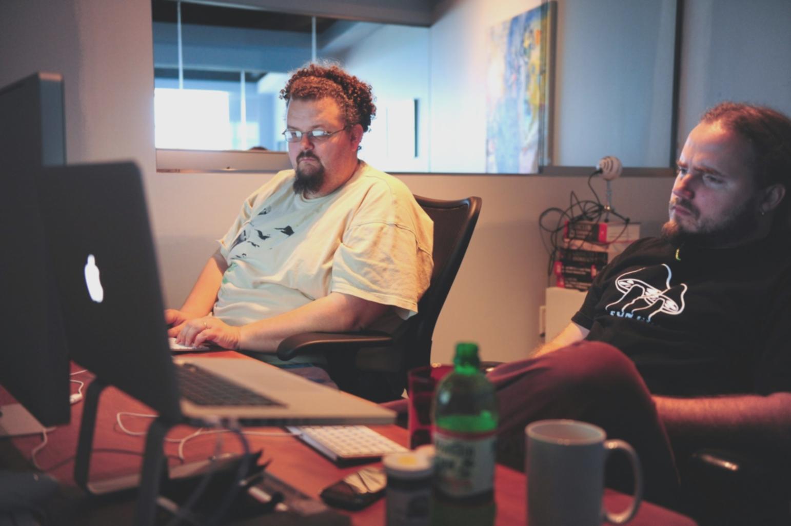 Collaborative algorithm design session with peers working together on computational problems